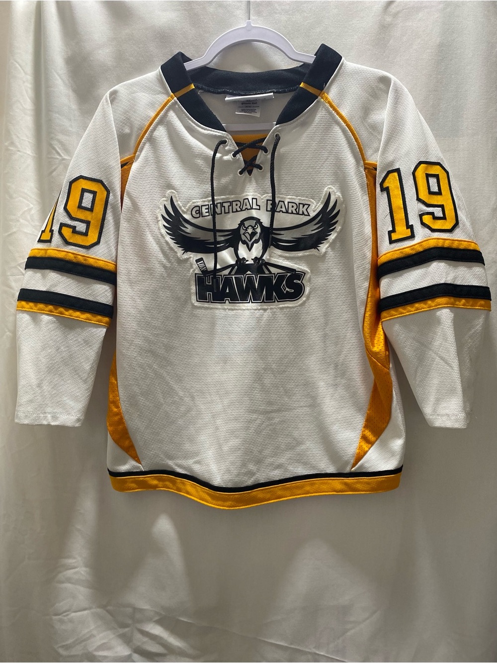Athletic Knit Central Park Hawks #19 Youth Medium Hockey Jersey WhiteBlackGold
